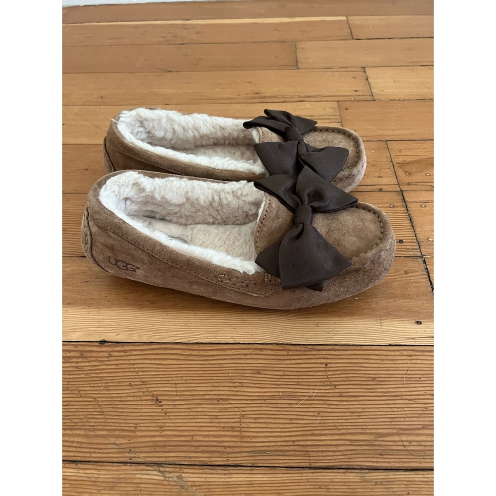 Women’s Ugg Slippers with Brown Bow.